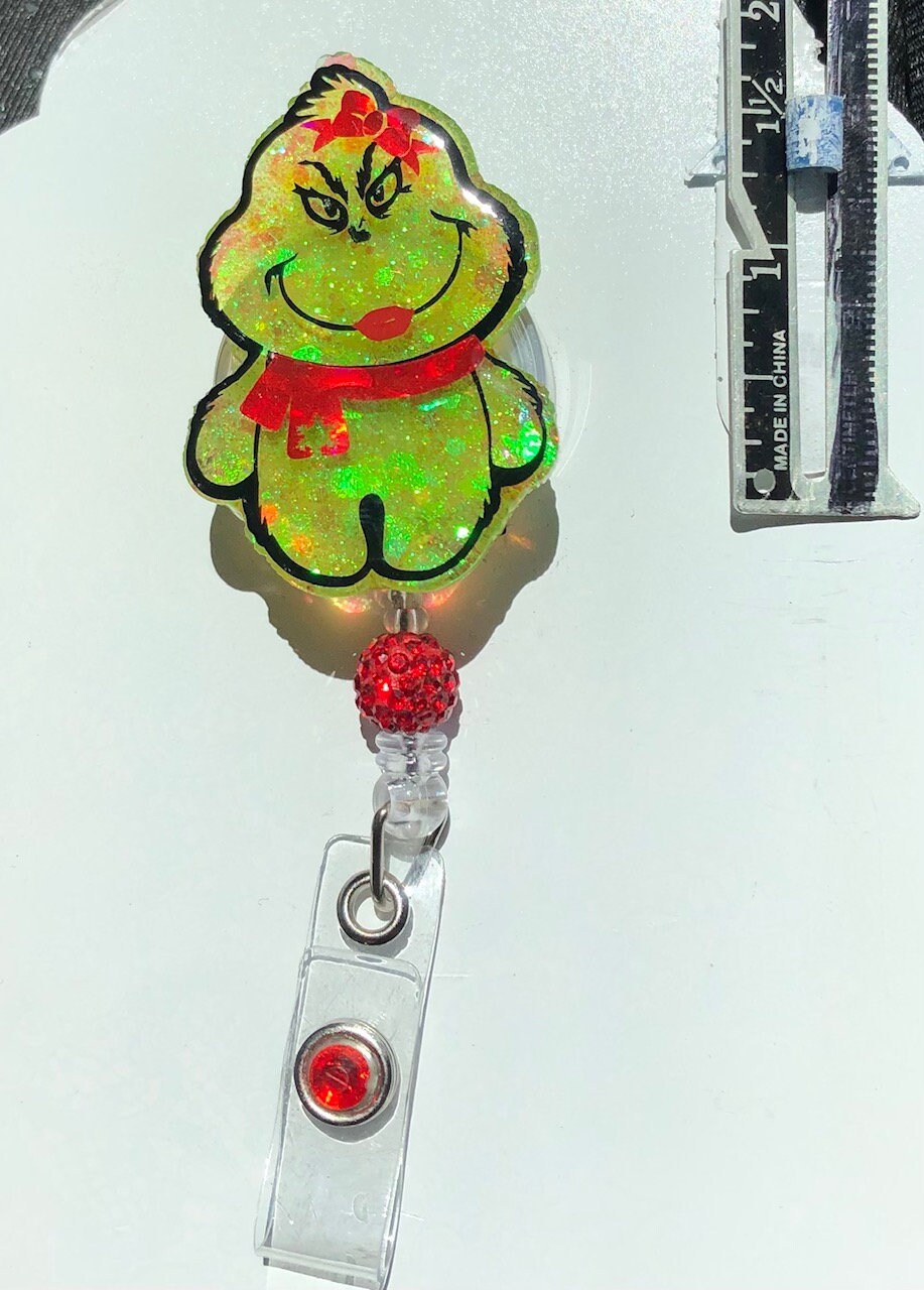 Little Furry Thing, Girl - Christmas - 2" retractable Badge Reel with Alligator Clip. Great for anyone required to wear a badge