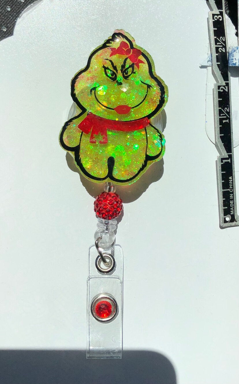 Little Furry Thing, Girl - Christmas - 2" retractable Badge Reel with Alligator Clip. Great for anyone required to wear a badge