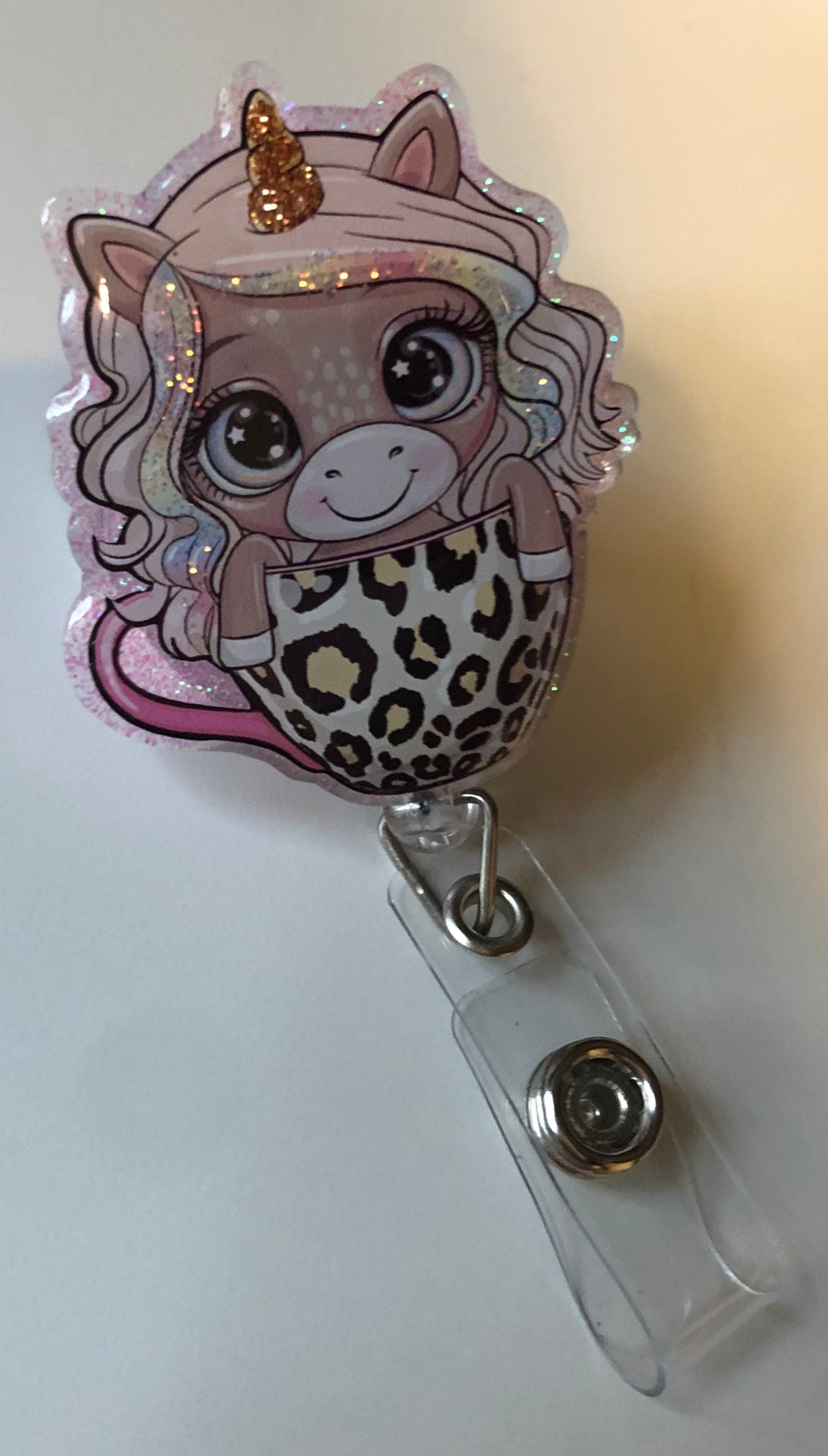 Cute Unicorn in Leopard Coffee Cup - 2" retractable Badge Reel with Alligator Clip. Great for anyone required to wear a badge