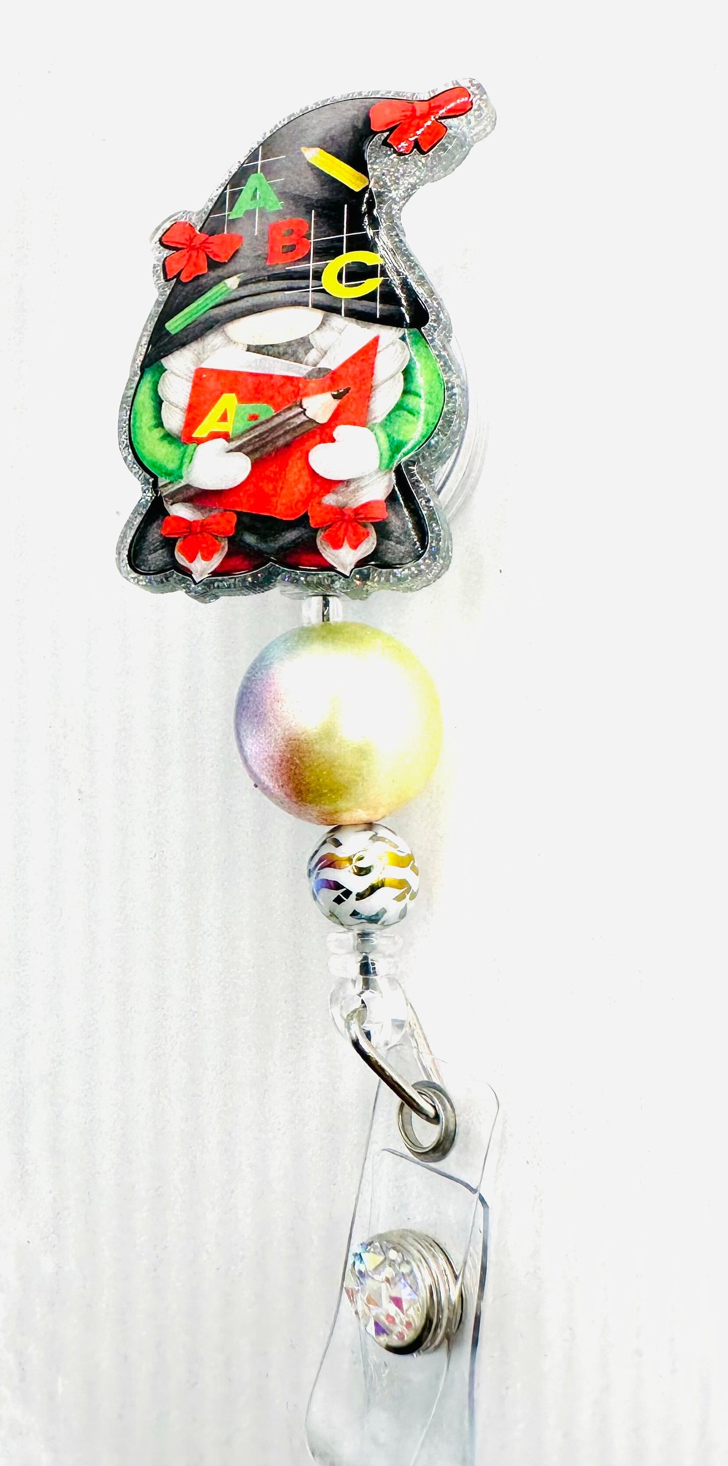 Gnome - ABC - Teacher - 2" retractable Badge Reel with Rainbow Bead and Alligator Clip. Great for anyone required to wear a badge