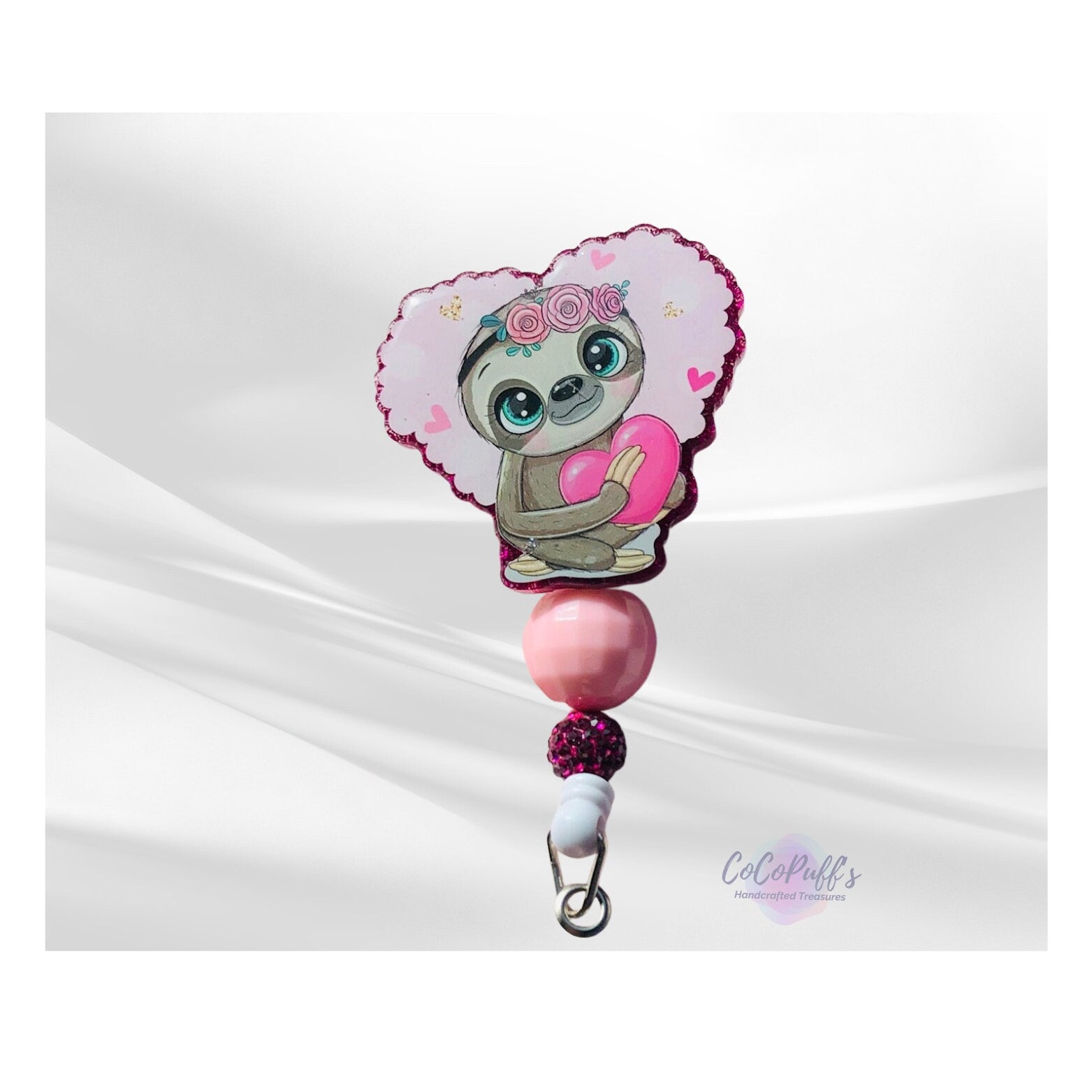 Cute Sloth holding a heart - retractable Badge Reel with Alligator Clip. Great for anyone required to wear a badge